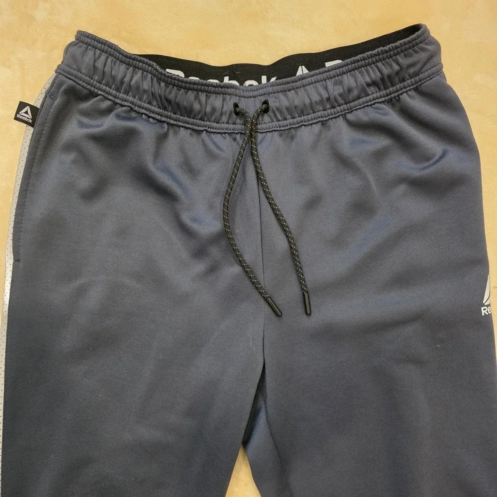 Reebok Men's Track Pants Size M Navy Blue Activewear Ankle Zip Drawstring